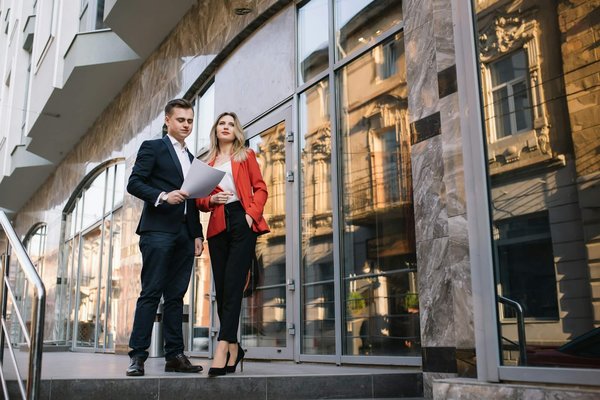 What is the best way to wear a silk blouse in a professional setting?